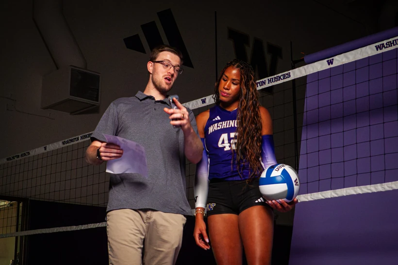 Adam Bender directing a Washington volleyball photo shoot