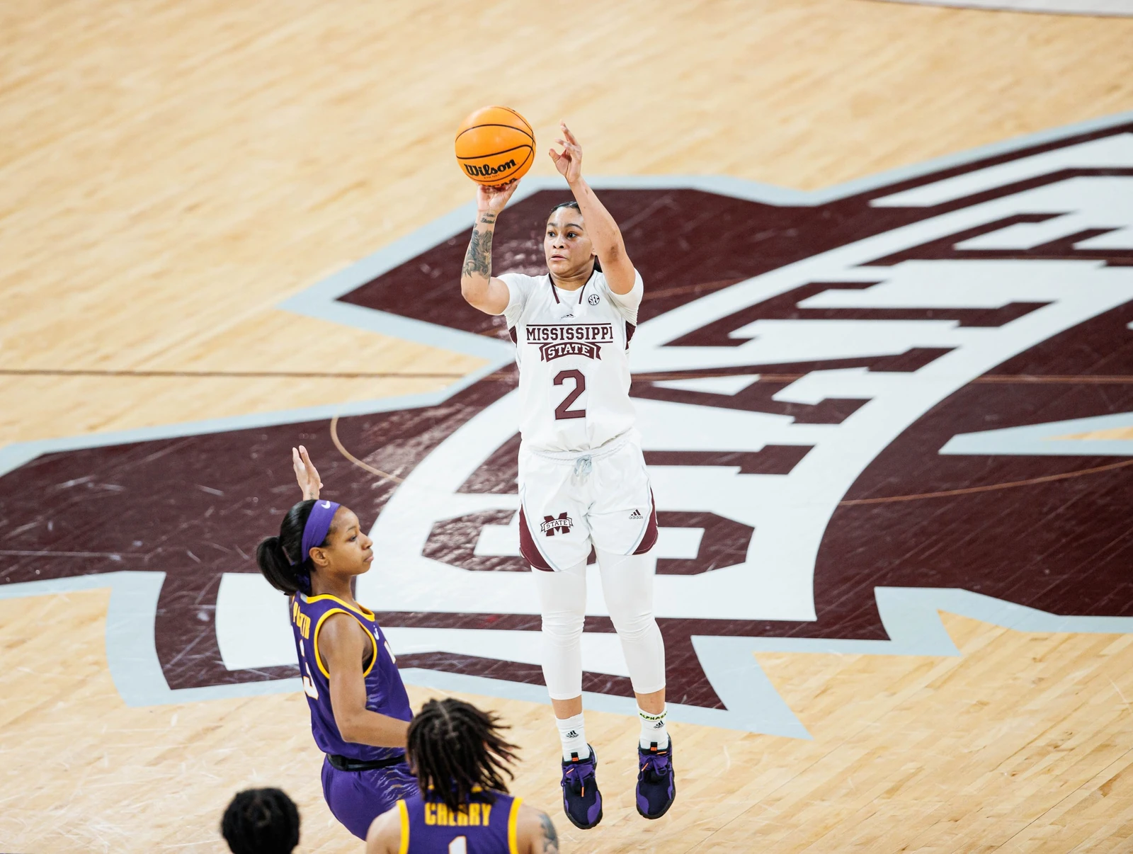 Mississippi State guard, JerKaila Jordan rising for a jump shot over an LSU defender