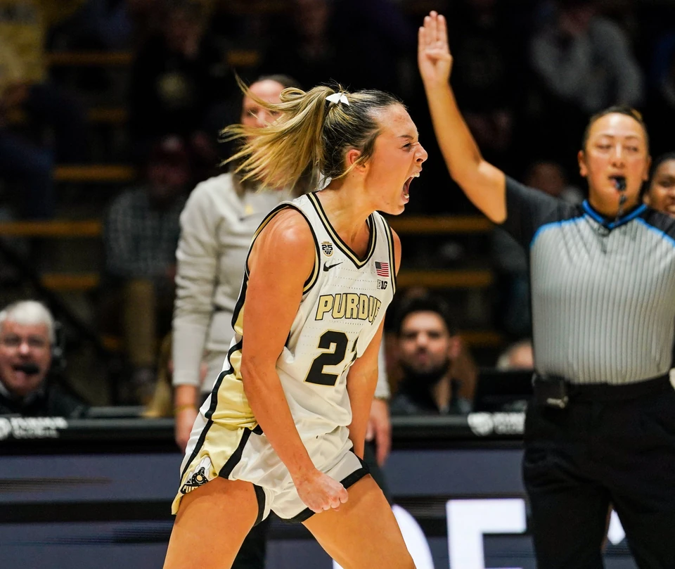 Purdue's Abbey Ellis celebrates after a three pointer