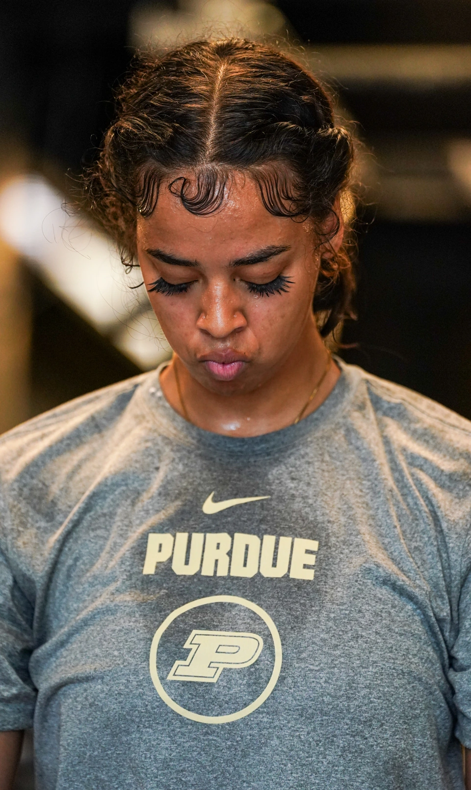 Purdue forward Mila Reynolds lifts weights in an offseason workout
