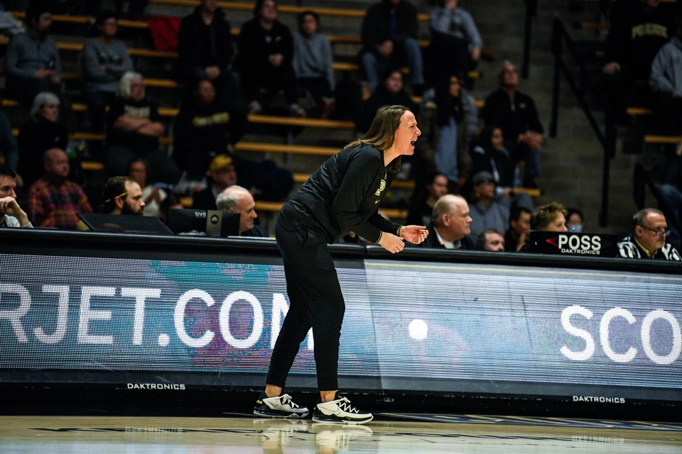Purdue head coach Katie Gearlds directing from the sideline