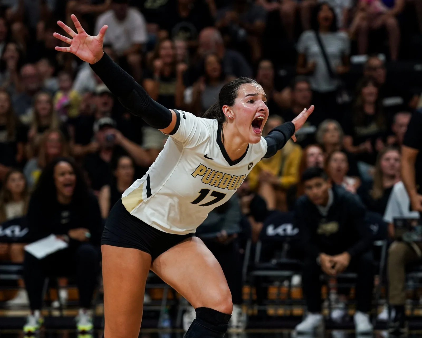Purdue outside hitter Eva Hudson celebrating a point