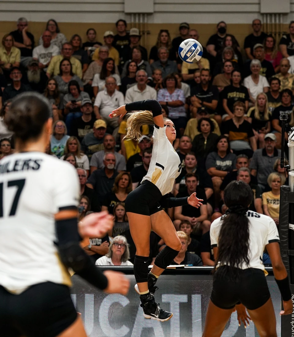 Purdue outside hitter Kenna Wollard attacking at the net