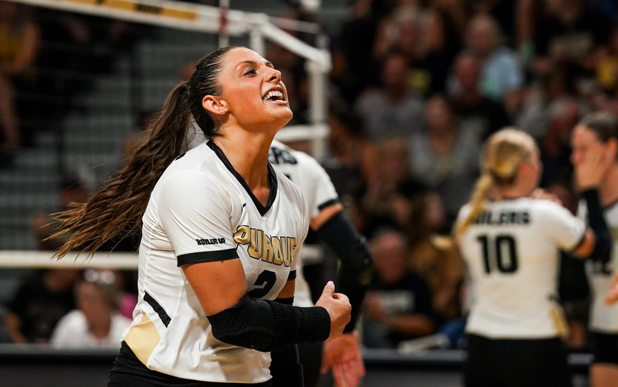 Chloe Chicoine attacking at the net